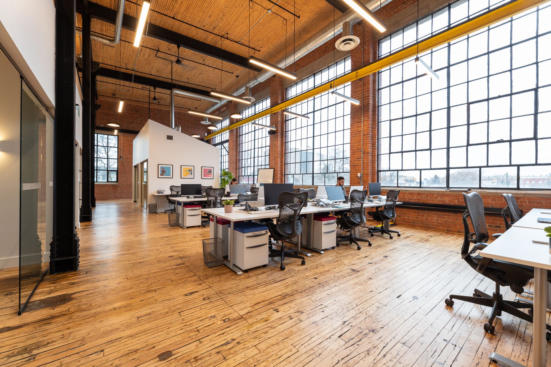 The bright open workspace at 213 Sterling Road, Toronto